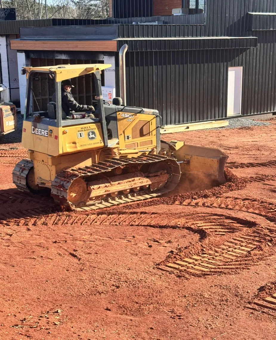 Dozer Grading Beside Modern Home β Platinum Construction & Crane